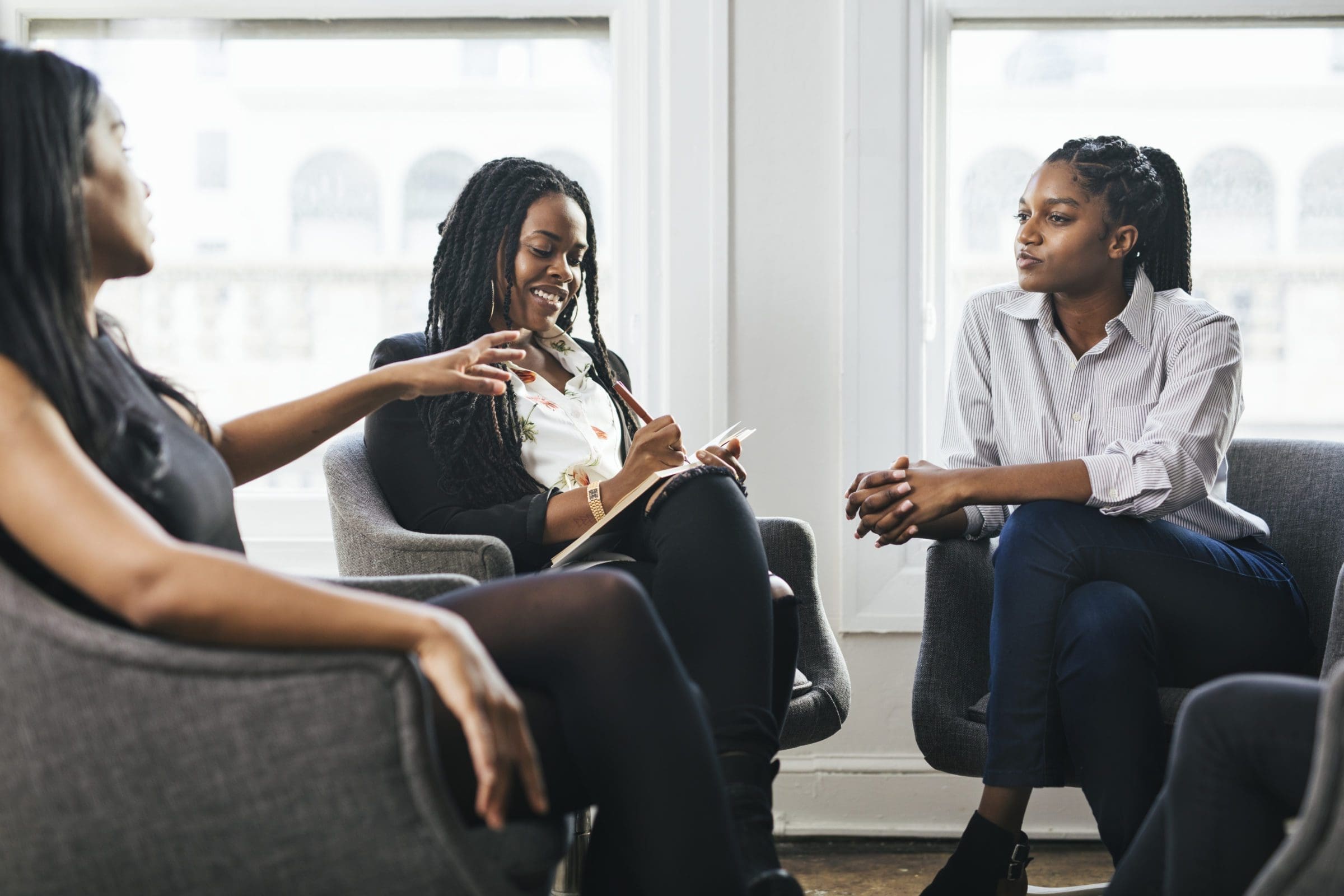 Professional businesswomen talking