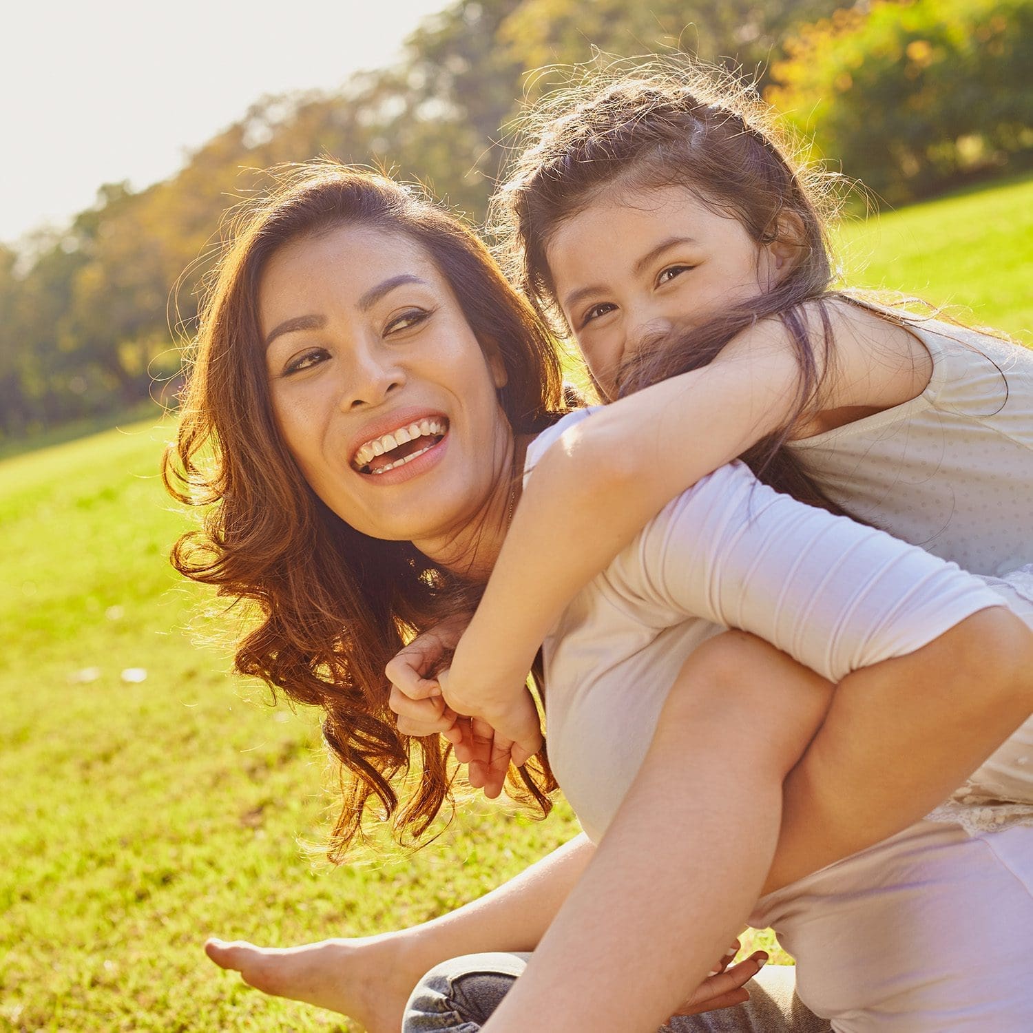 Lifestyle portrait mom and daughter in happines at the outside i