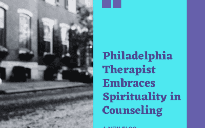 The image is a promotional graphic for a blog post, with a background photograph of a row of traditional brick townhouses that could be found in Philadelphia. In the foreground, there is a translucent overlay with text that reads "Philadelphia Therapist Embraces Spirituality in Counseling" in bold white letters. Below the headline, it states "A NEW BLOG" followed by the author's name "By L. Stewart Barbera Jr., PsyD, MSW" in smaller font. The text is arranged on a bright cyan-colored rectangle which contrasts with the background. The graphic is designed to be eye-catching and informative, likely intended for sharing on social media or a website to attract readers to the blog article.